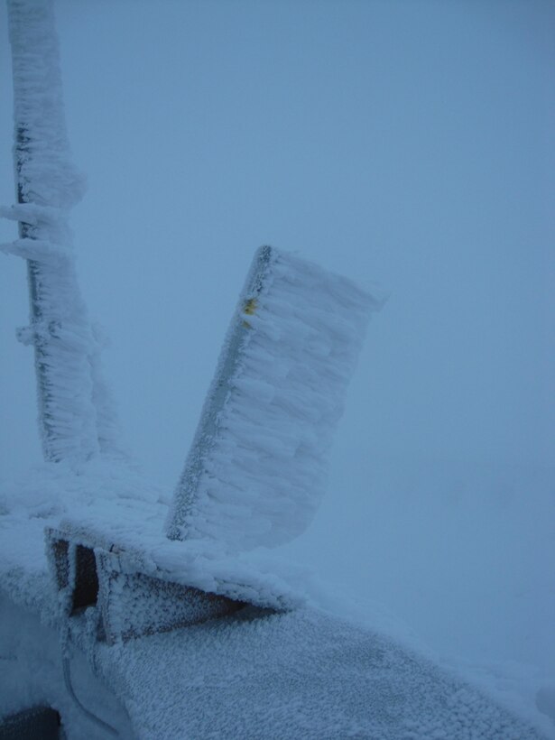 Rime ice accreted on the windward side of this cylinder mounted on the rail of the Observatory tower where the ERDC-Cold Regions Research and Engineering team conducted multicylinder observations