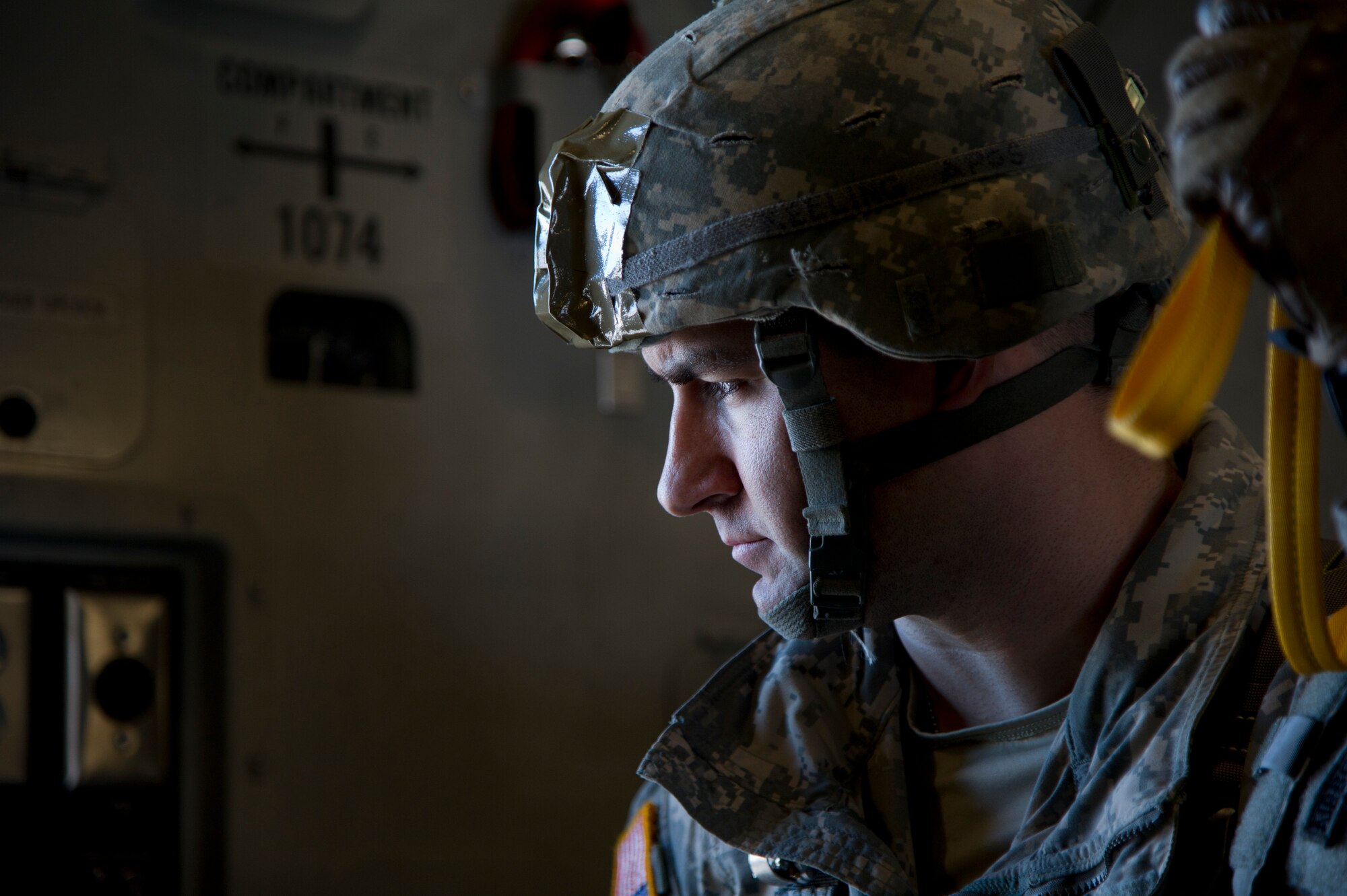 Sgt. 1st Class Corey Keeling holds his static-line in the “stand-by” position as he prepares to jump from a C-17 Globemaster III from the 517th Airlift Squadron over Malemute Drop Zone at Joint Base Elmendorf-Richardson, Alaska, Feb. 27, 2014. (U.S. Air Force photo/Staff Sgt. Sheila deVera)