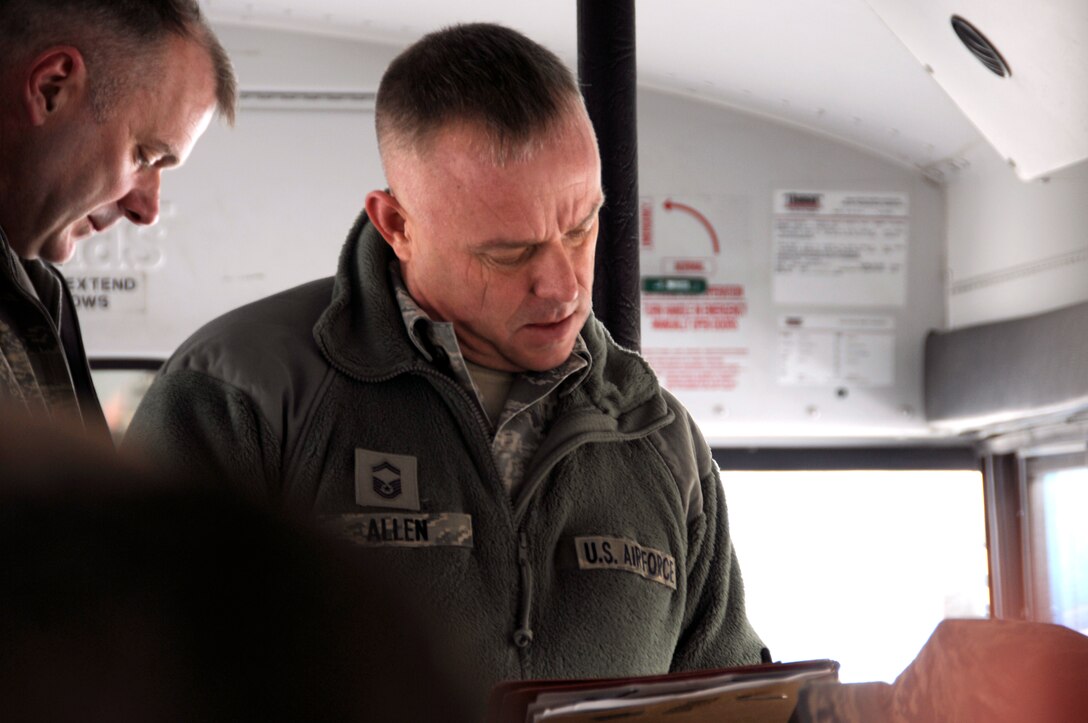 Senior Master Sgt. Gary Allen takes roll call before Wing members depart Barnes Air National Guard Base, Westfield Mass., in route to Joint Base Pearl Harbor-Hickam, Hawaii, to participate in a Sentry Aloha exercise, March 3, 2014. (U.S. Air National Guard photos by 2nd. Lt. Anthony Mutti/Released)