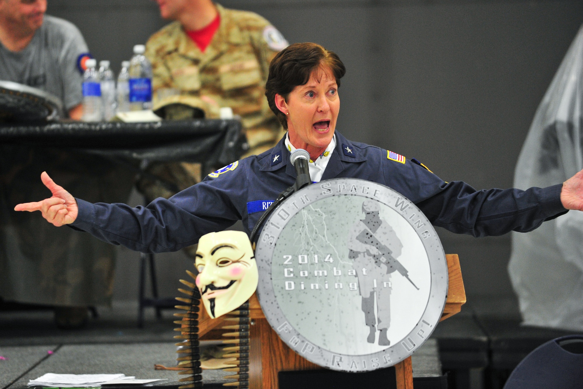 Air Force Reserve Brig. Gen. Karen A. Rizzuti expresses her appreciation for the Airmen in the audience March 1, 2014, during the 310th Space Wing's Combat Dining In/Annual Awards Ceremony at Peterson Air Force Base, Colo. The wing sponsored the event to both recognize its annual award winners and bring together the Reservists to enjoy an evening of esprit de corps, unit morale and camaraderie. Rizzuti, the guest speaker at the event, is the Mobilization Assistant to the 24th Air Force commander. (U.S. Air Force photo/Tech. Sgt. Nicholas B. Ontiveros)