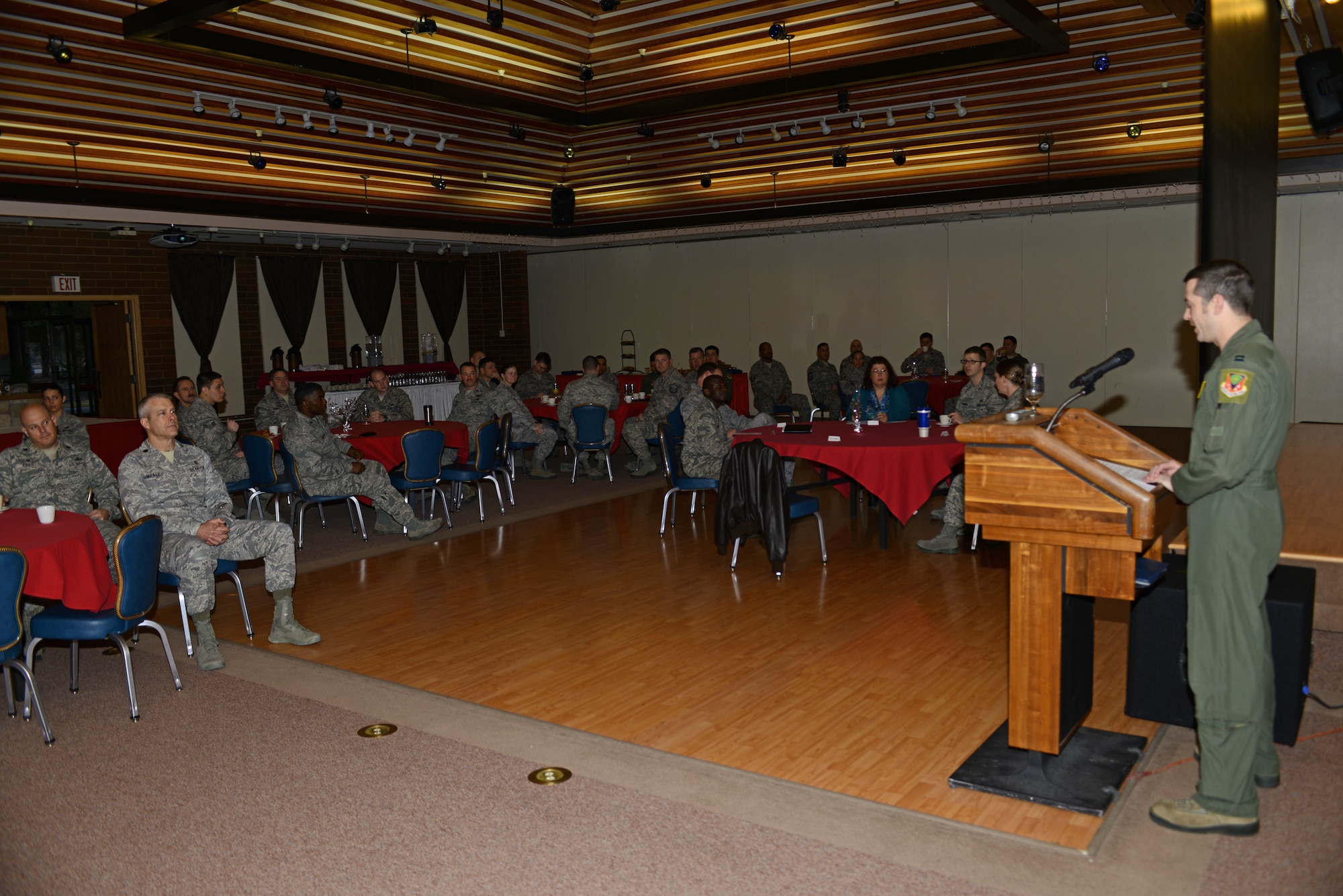 Capt. Benjamin Hoffman, 391st Fighter Squadron director of training speaks at the Air Force Assistance Fund kick-off breakfast March 3, 2014, at Mountain Home Air Force Base, Idaho. The base goal for this year is $62,190 and Airmen can donate  to one of the following charitable affiliates; the Air Force Aid Society, the General and Mrs. Curtis E. LeMay Foundation, the Air Force Village, and the Air Force Enlisted Village.   