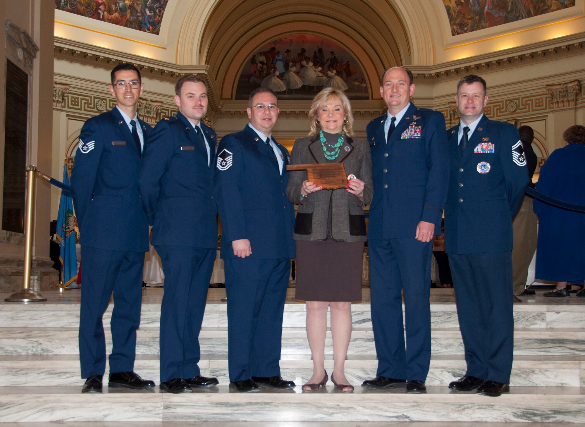 Pictured from left to right: Staff Sgt. Matthew Quackenbush, 507th Air Refueling Wing recruiting, Maj. Jon Quinlan, 507th ARW public affairs, Master Sgt. Stewart Frazier, 507th ARW recruiting, Oklahoma Gov. Mary Fallin, Col. Thomas Smith, 507th Operations Group commander and Senior Master Sgt. Kenneth Toon, 507th ARW recruiting flight chief.   The members of the 507th ARW presented the governor a plaque and wing coin to thank her for her support to Air Force Reserve recruiting efforts in the greater Oklahoma area.  (Courtesy Photo)