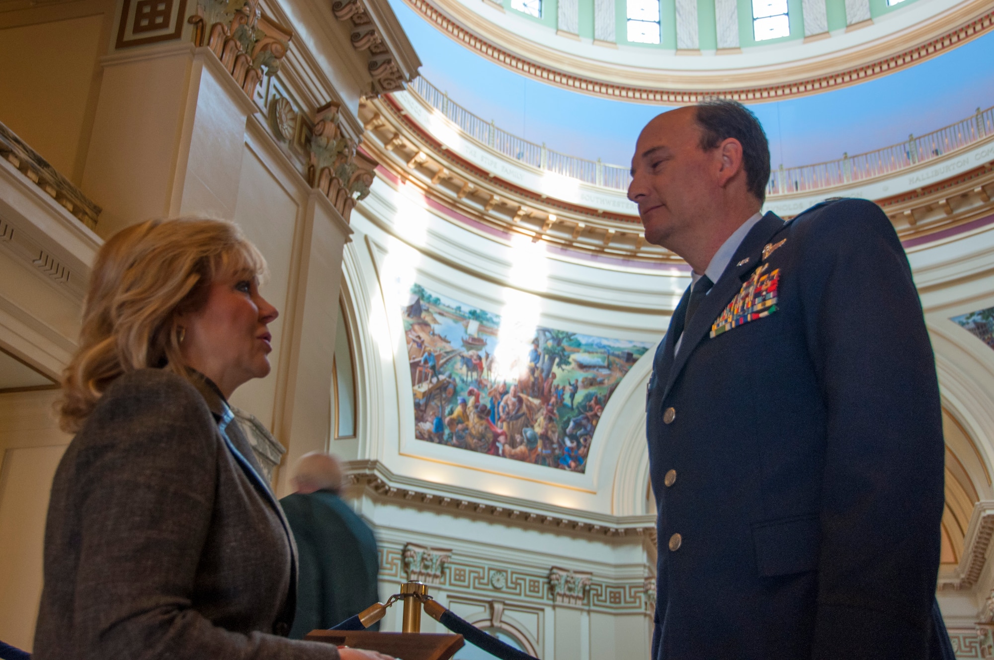 Colonel Thomas Smith, right 507th ARW Operations Group commander speaks with Gov. Mary Fallin at the Oklahoma State Capital, March 5.  The colonel and new members of the 507th ARW recruiting flight met with the governor to thank her for her support to recruiting efforts in the greater Oklahoma area. (U.S. Air Force Photo/Maj. Jon Quinlan) 