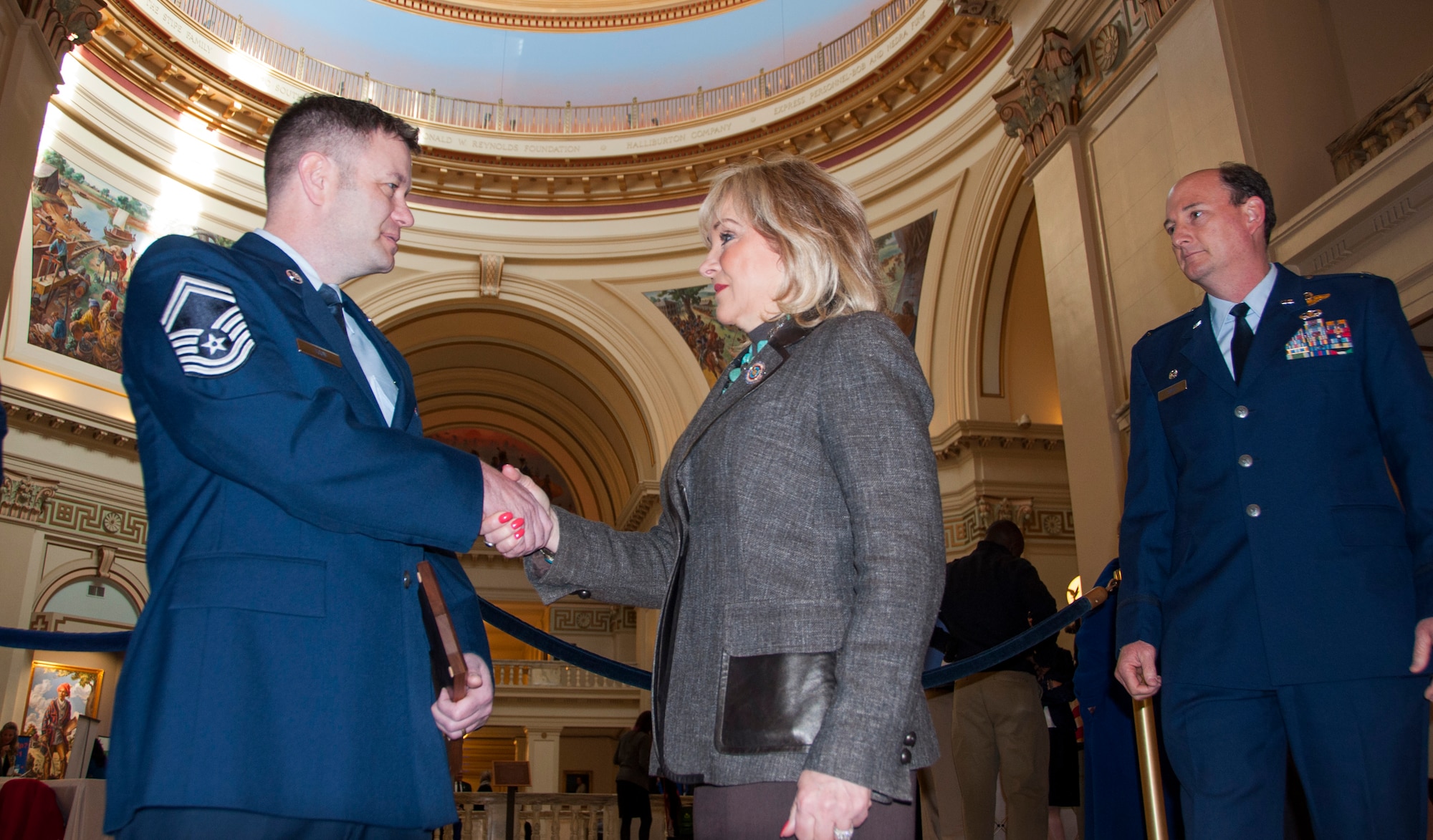 Senior Master Sgt. Kenneth Toon, left 507th Air Refueling Wing recruiting flight chief greets Gov. Mary Fallin at the Oklahoma State Capital, March 5 along with Col. Thomas Smith, 507th Operations Group commander, right.   Some of the 507th Air Refueling Wing’s newest Air Force Reserve recruiters met with the Oklahoma governor to thank her for her support to their recruiting efforts in the greater Oklahoma area.  (U.S. Air Force Photo/Maj. Jon Quinlan)