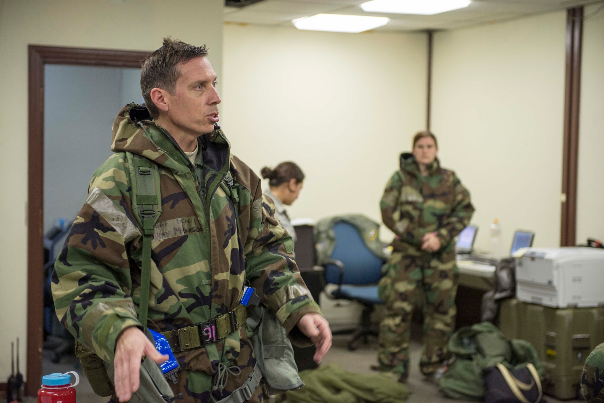 Lt. Col. Jeffrey Menasco, 36th Airlift Squadron commander, speaks to his Airmen during the Samurai Readiness Inspection at Yokota Air Base, Japan, March 5, 2014.  Many different units around the base were put to the test, ensuring they were capable to complete their duty under any difficult situations.  (U.S. Air Force photo by Airman 1st Class David Danford / released)