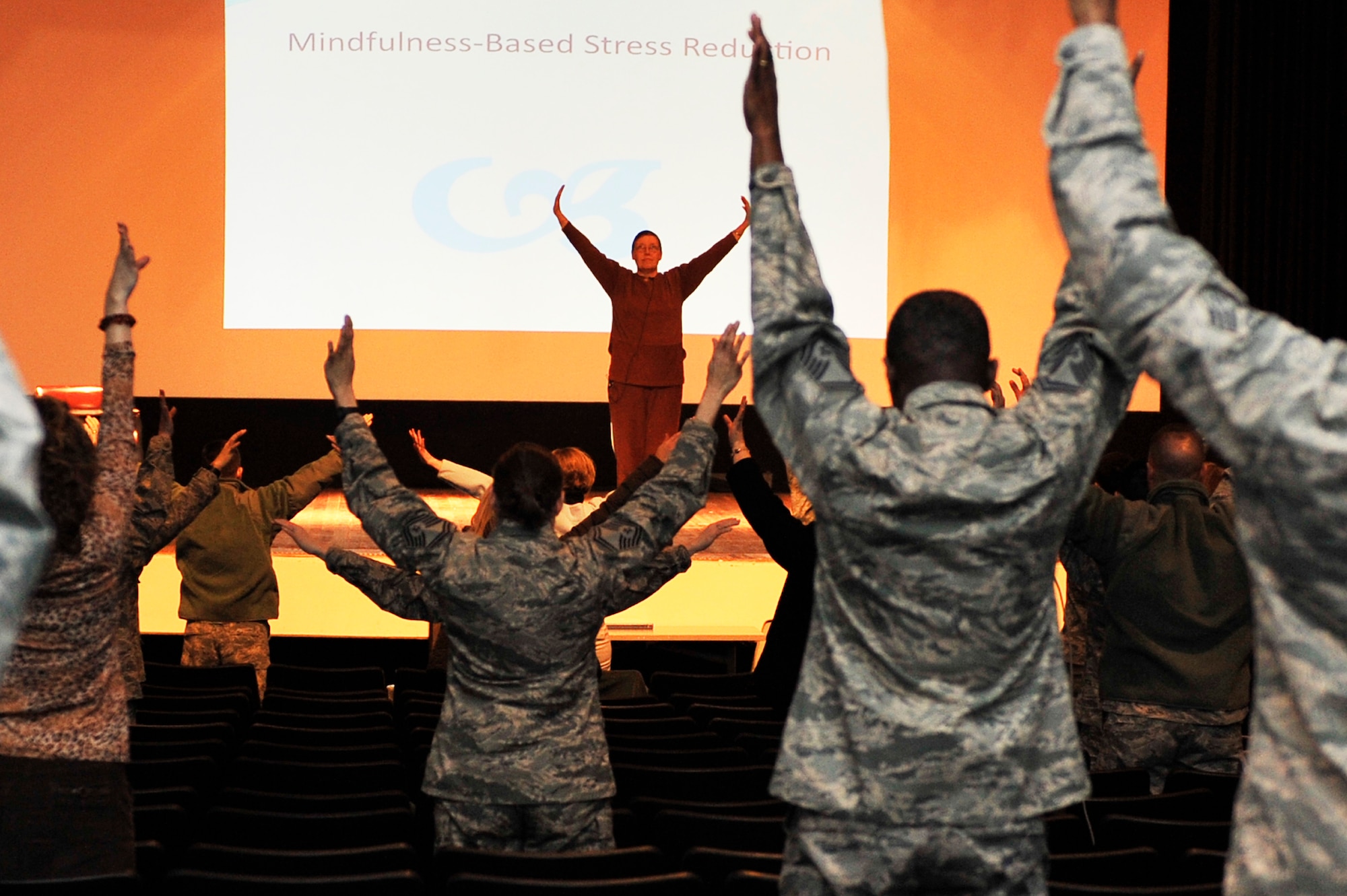 Bridget Rolens demonstrates various mindfulness activities during the Mindfulness-Based Stress Reduction luncheon Feb. 27 at Scott. Mindfulness meditation is being used in a variety of ways in the military. Rolens is the owner and program facilitator for the Pathways to Mindfulness. (U.S. Air Force photo/Airman 1st Class Kiana Brothers)