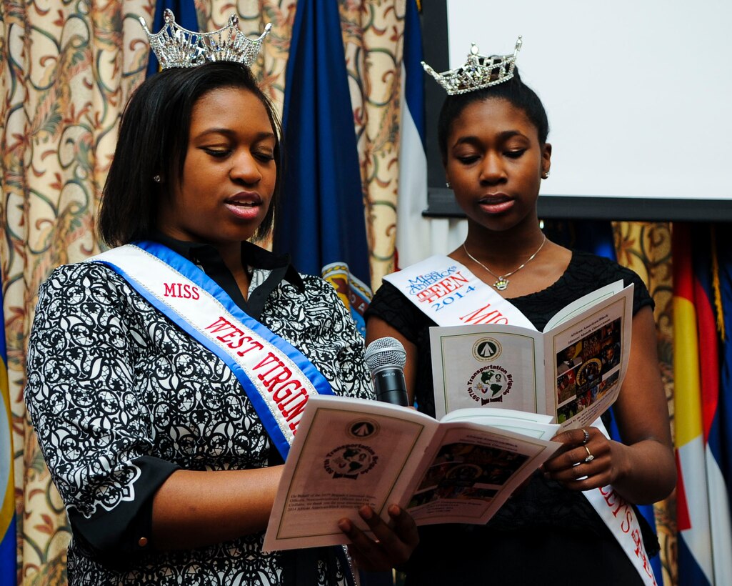 From left, A’Leah Burrell, 17, 2013 collegiate-level Miss West Virginia, and her 15-year-old sister, Taylor Burrell, 2013 Miss Roanoke Valley Outstanding Teen, sing during an African-American History Month observance luncheon at Fort Eustis, Feb. 26, 2014. Both sisters expressed their appreciation towards Service members, and enjoyed sharing their talents with Fort Eustis. Both sisters hail from Yorktown, Va. (U.S. Air Force photo by Senior Airman Austin Harvill/Released)