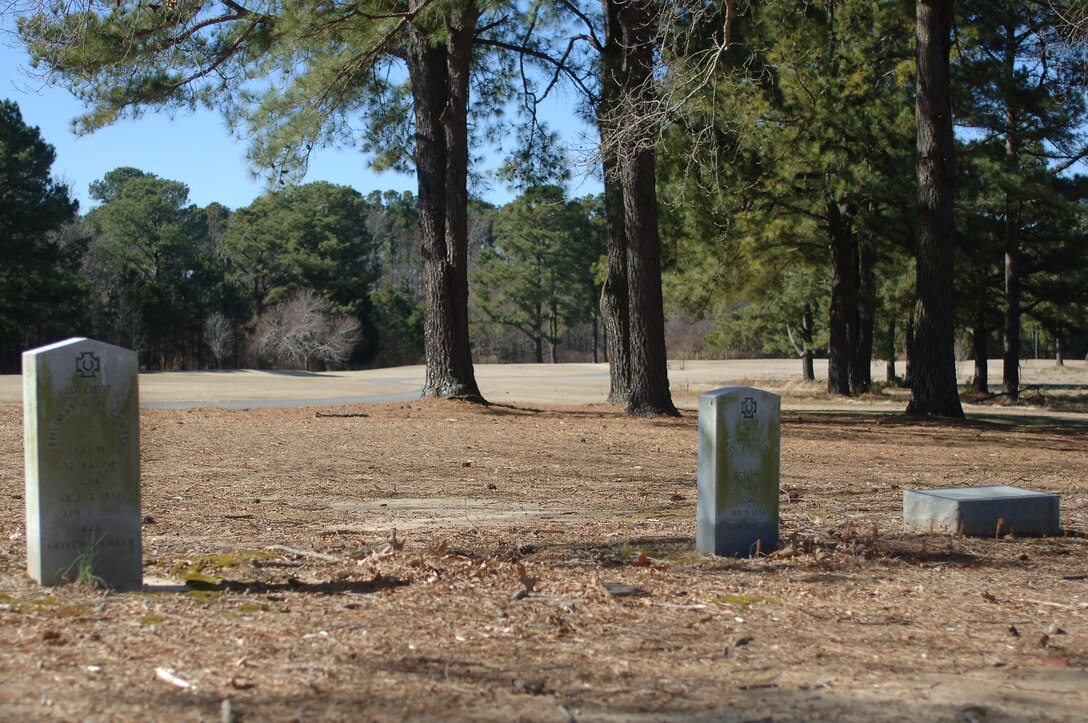 The gravesites for Dr. (Capt.) Humphrey Harwood Curtis Jr., a Confederate Army doctor, along with members of his family, lay between what is now the third and fourth hole of the Pines Golf Course at Fort Eustis, Va. The burial sites of many Confederate Soldiers were lost due to a lack of records after Mulberry Island, the land now known as Fort Eustis, was purchased by the U.S. government in 1918. (U.S. Air Force photo by Senior Airman Teresa Aber/Released)