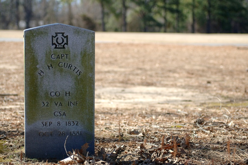 The late Dr. (Capt.) Humphrey Harwood Curtis Jr., a Confederate Army doctor, was laid to rest between what is now the third and fourth hole of the Pines Golf Course at Fort Eustis, Va. Many historians believed his grave was on the golf course, but due to a lack of records or individuals able to identify the location, didn’t know for sure until May 2001 when archaeologists identified the cemetery. (U.S. Air Force photo by Senior Airman Teresa Aber/Released)