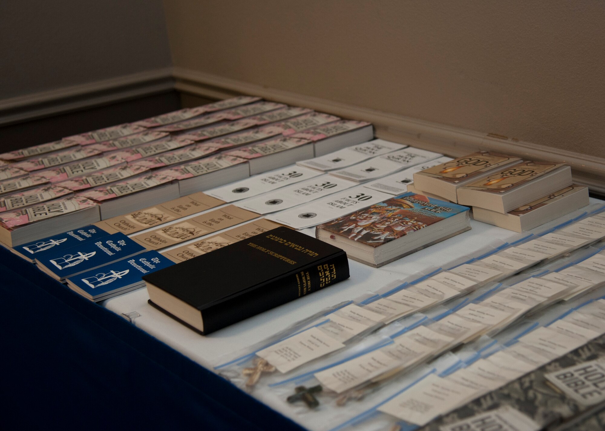 Religious books are set on display during Laughlin’s National Prayer Luncheon at Club XL on Laughlin Air Force Base, Texas, Feb. 27, 2014. The books were free to those who wanted or needed them for religious purposes. (U.S. Air Force photo/Airman 1st Class Jimmie D. Pike)