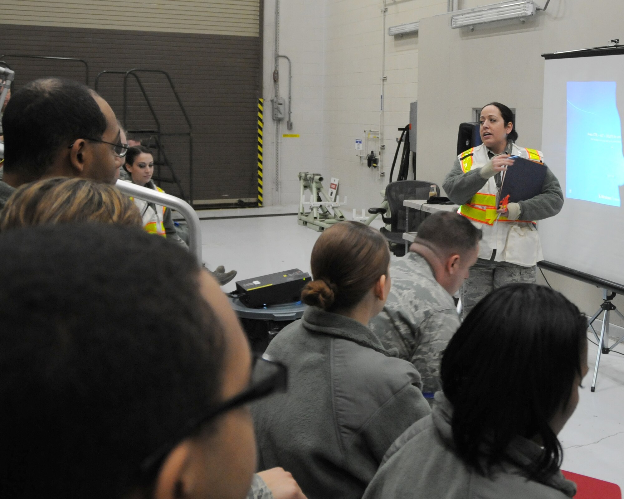 Air Force Reserve Master Sgt. Kelly Turner, Personnel Deployment Function (PDF) line Noncommissioned Officer in Charge and 910th Airlift Wing career advisor, instructs Airmen during a deployment exercise on Saturday of the March Unit Training Assembly here, March 1, 2014. The exercise was designed to give Airmen the chance to practice rapidly deploying large groups. U.S. Air Force photo/Tech. Sgt. Jim Brock.