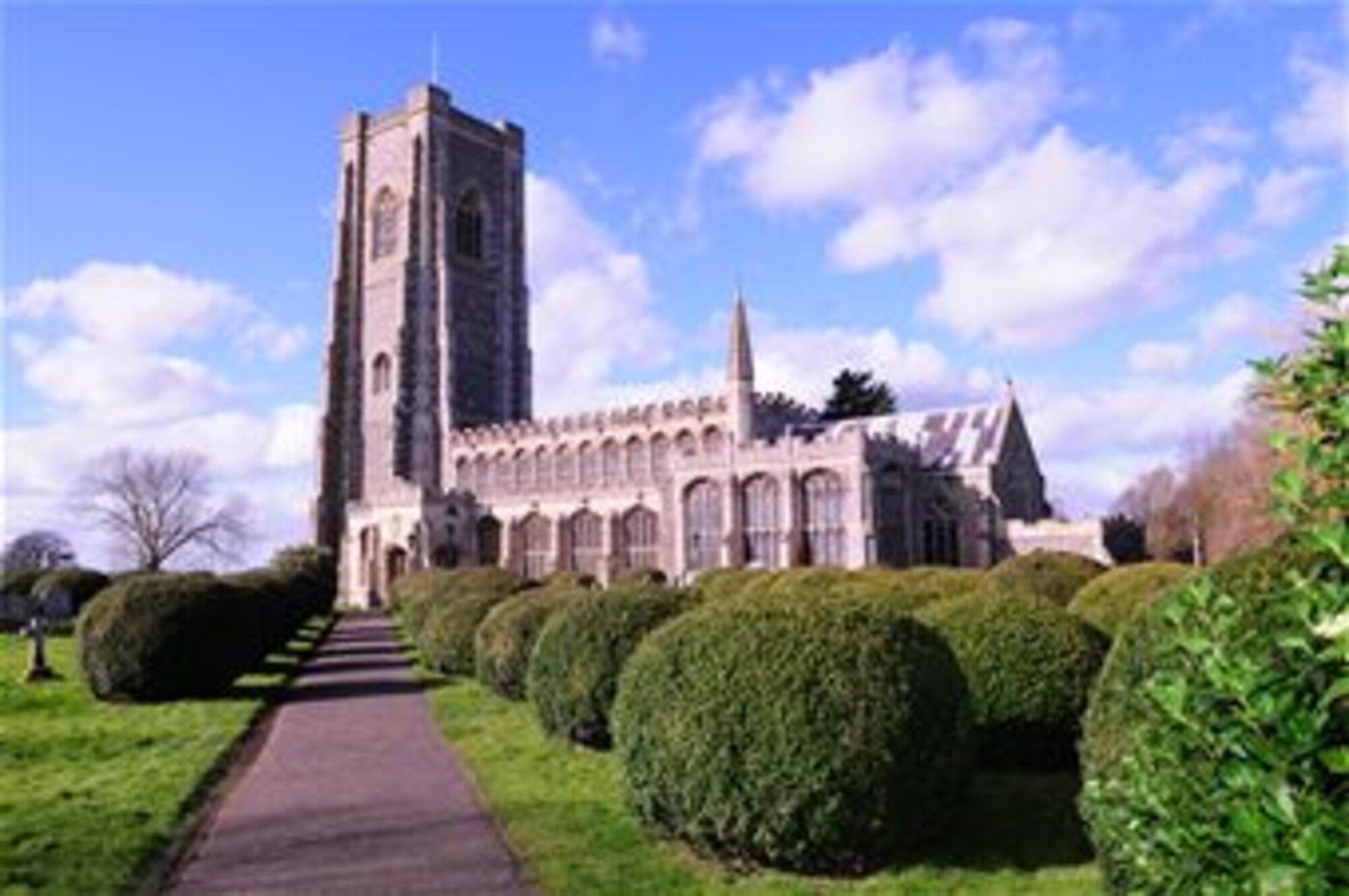 St. Peter and St. Paul's Church in Lavenham, Suffolk, is a Grade I listed church and is one of the best-known in the county. Local merchants, who made their fortunes in the wool industy, built the church. The major benefactors of the church were John de Vere, the 13th Earl of Oxford and a lord of Lavenham manor, and three generations of local merchants named Thomas Spring. The long nave of seven bays is more than 150 feet long and 70 feet wide, and is lit by perpendicular windows. (U.S. Air Force photo by Karen Abeyasekere/Released)