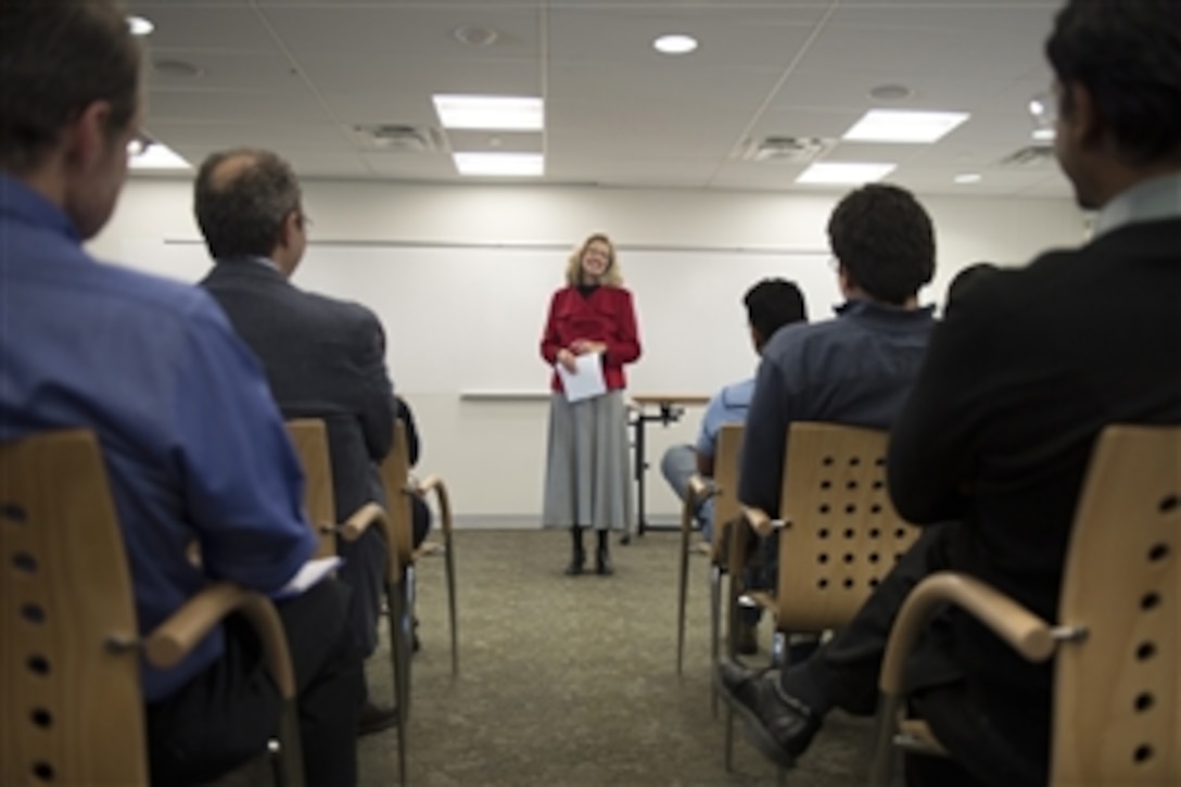 Acting Deputy Defense Secretary Christine H. Fox discusses her experiences as well as opportunities for women in science and government during a conversation with students and faculty at George Mason University in Fairfax, Va., March 5, 2014. Fox earned undergraduate and graduate degrees in mathematics at the university.