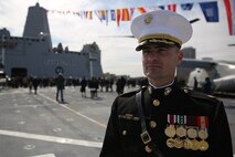 Maj. Shawn D. Tyson, a Roseburg, Ore. native, and the commander of troops for the 2nd Marine Logistics Group Somerset ceremony detachment, stands aboard the USS Somerset during a commissioning ceremony in Penn’s Landing, Philadelphia, March 1, 2014. The San Antonio-class amphibious troop transport is the third and final transport built with metal salvaged after the 9/11 terrorist attacks and was named in honor of the passengers of United Airlines Flight 93, which crashed in Somerset County, Pa.