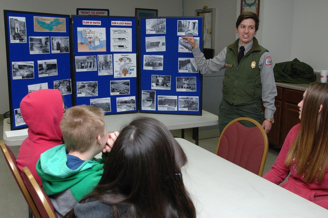 Old Hickory Lake Park Ranger Courtney Eason of the U.S. Army Corps of Engineers Nashville District talks to Stratford STEM Magnet High School freshmen Feb. 27, 2014 about the navigation mission at Old Hickory Dam.