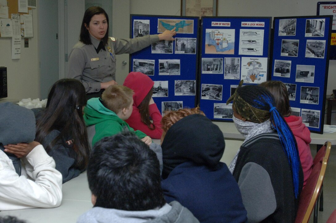 Old Hickory Lake Park Ranger Amy Redmond of the U.S. Army Corps of Engineers Nashville District talks to Stratford STEM Magnet High School freshmen Feb. 27, 2014 about the hydropower mission at Old Hickory Dam. 