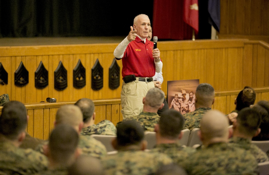 Retired Sgt. Maj. Eddie Neas, a Vietnam veteran, speaks to more than 1,000 service members at the first presentation of the documentary “Against the Odds, the Marines at Hue” at the Base Theater aboard Marine Corps Base Camp Lejeune, Feb. 27.  The theater was filled to capacity as Neas, one of many Vietnam veterans in attendance, recanted his time in the battle of Hue City and answered questions about the conditions the Marines fought in. The battle of Hue City is regarded as one of the deadliest battles in Marine Corps history at that time.
