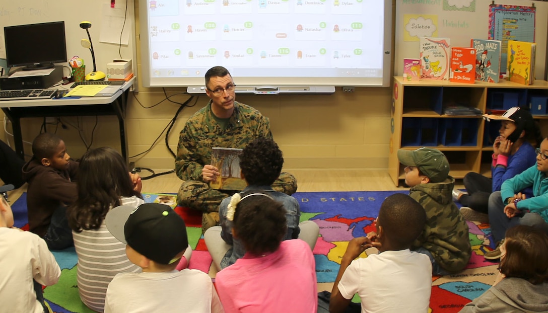 Brig. Gen. Robert F. Castellvi, the commanding general of Marine Corps Base Camp Lejeune, reads to a 4th grade class at Tarawa Terrace Elementary School aboard Marine Corps Base Camp Lejeune, March 3. Castellvi visited the school to support Read Across America Day, an annual nationwide literacy event. “I am so proud to be a part of this program,” said Castellvi. “Reading sets the foundation for all learning. An enthusiasm for reading in our kids can start a spark that will ignite a thirst for knowledge and set them up for the future.”
