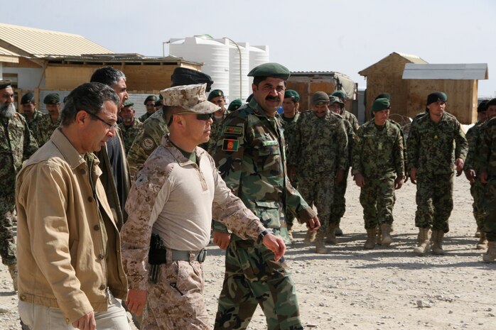 Brigadier Gen. Daniel D. Yoo, center, Regional Command (Southwest) commanding general, observes a formation of Afghan National Army's 4th Brigade, 215th Corps soldiers held during a security shura aboard Forward Operating Base Delaram, Nimroz province, Afghanistan, March 4, 2014. During the shura, Brig. Gen. Yoo, Marine Expeditionary Brigade - Afghanistan staff, Marines with Security Force Assistance Advisor Team 4-215 and Afghan officials discussed the upcoming presidential election and security measures being emplaced to ensure the safety of the local people.