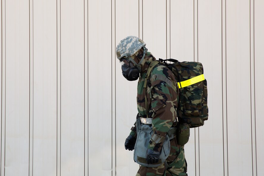Senior Airman Jacob Hall, 374th Maintenance Squadron, completes a Post Attack Reconnaissance sweep during a Samurai Readiness Inspection at Yokota Air Base, Japan, March 6, 2014. The purpose of a PAR sweep is to check around the building for casualties, damage to the building, contaminates or unexploded ordnances. (U.S. Air Force photo by Osakabe Yasuo/Released) 