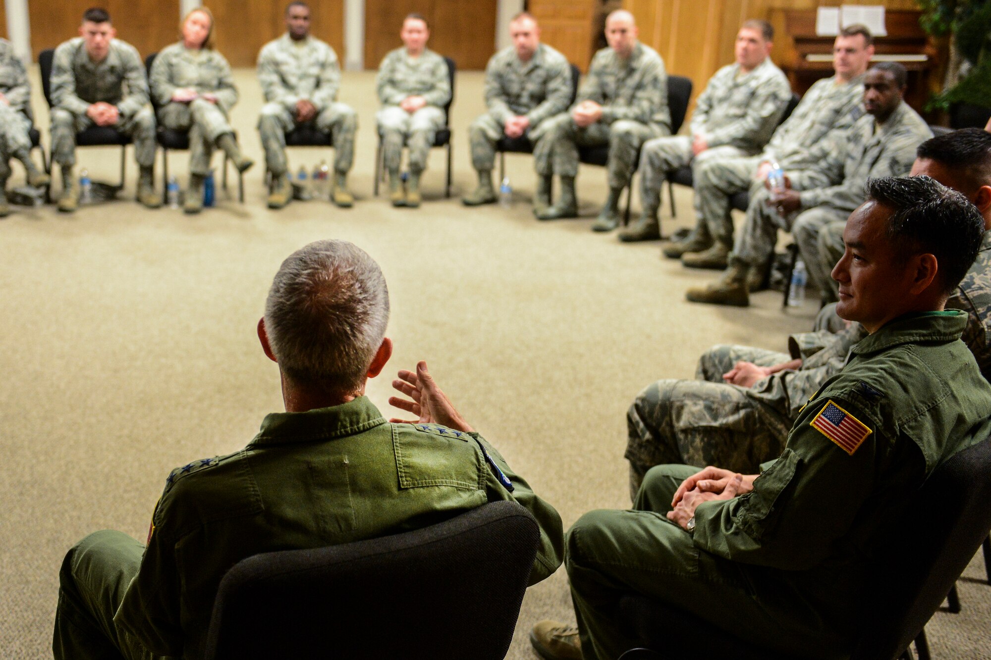 Lt. Gen. Brooks Bash, Air Mobility Command vice commander, left foreground, addresses NCOs March 6, 2014, at Joint Base Lewis-McChord, Wash. Bash was conducting a front-line supervisor roundtable discussion with McChord Airmen during one of his stops on his visit to JBLM. Among the topics discussed during the roundtable were the current force shaping measures, the forthcoming AEF Next deployment system, and tools for mentoring Airmen. (U.S. photo by Tech. Sgt. Sean Tobin)