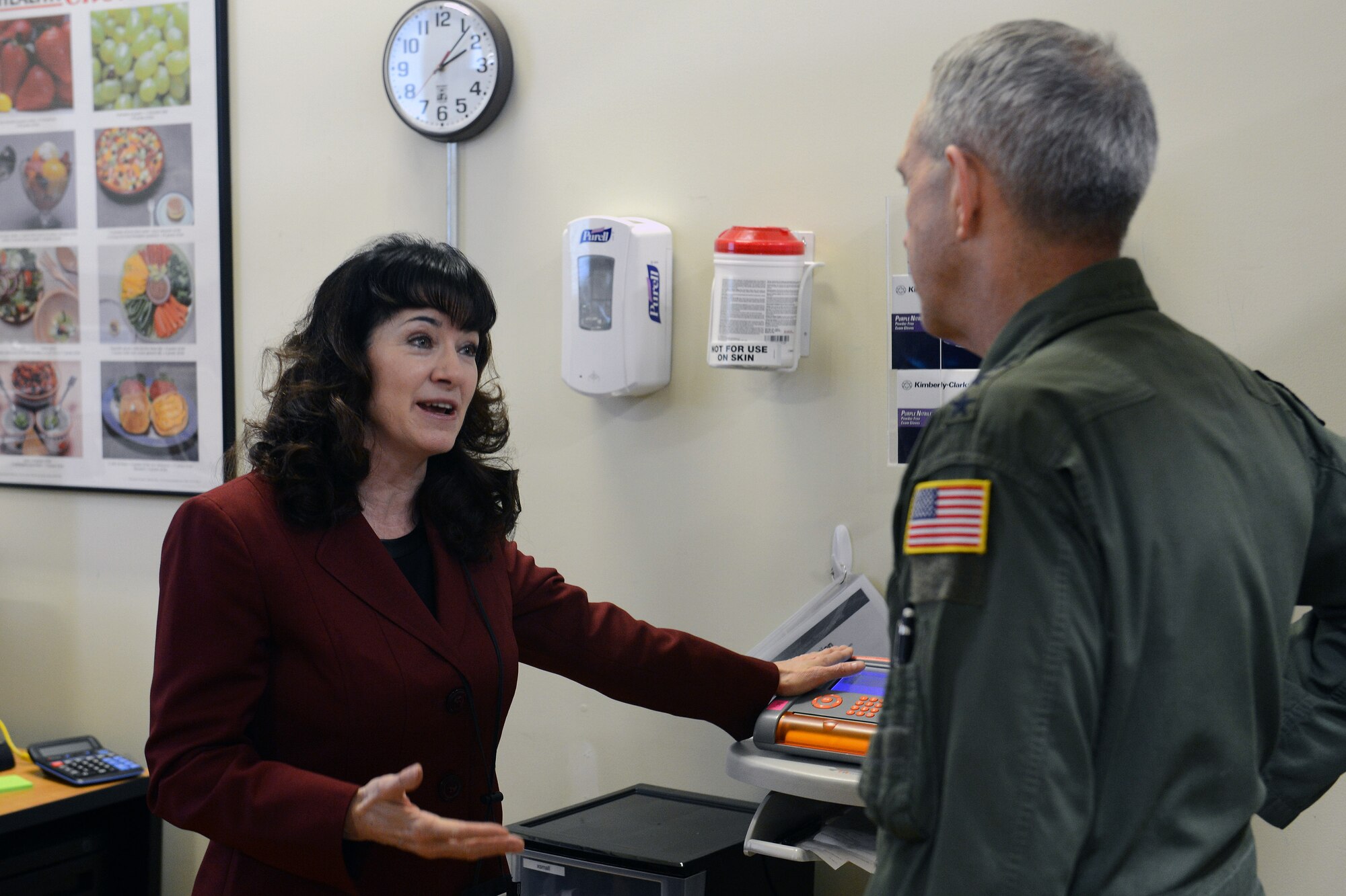 Dr. Teresa Bruder, Armed Forces Wellness Center director, guides Lt. Gen. Brooks Bash, Air Mobility Command vice commander, on a tour of the center’s metabolic lab March 5, 2014, at Joint Base Lewis-McChord, Wash. During his visit, Bash also visited the Stone Education Center for an overview of JBLM’s apprenticeship programs aimed at helping transitioning service members acquire marketable skillsets for civilian employment. (U.S. Air Force photo/Airman 1st Class Jacob Jimenez) 