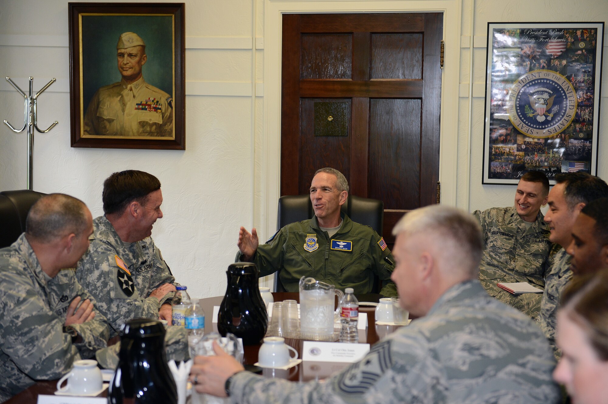 Lt. Gen. Brooks Bash, Air Mobility Command vice commander, speaks to Joint Base Lewis-McChord senior leadership March 5, 2014 at JBLM, Wash. During his visit to the joint base, Bash received an in-depth briefing on JBLM’s overall progress as a joint base from Army Col. Chuck Hodges, JBLM commander and Col. Anthony Davit, 627th Air Base Group commander. (U.S. Air Force photo/Airman 1st Class Jacob Jimenez)