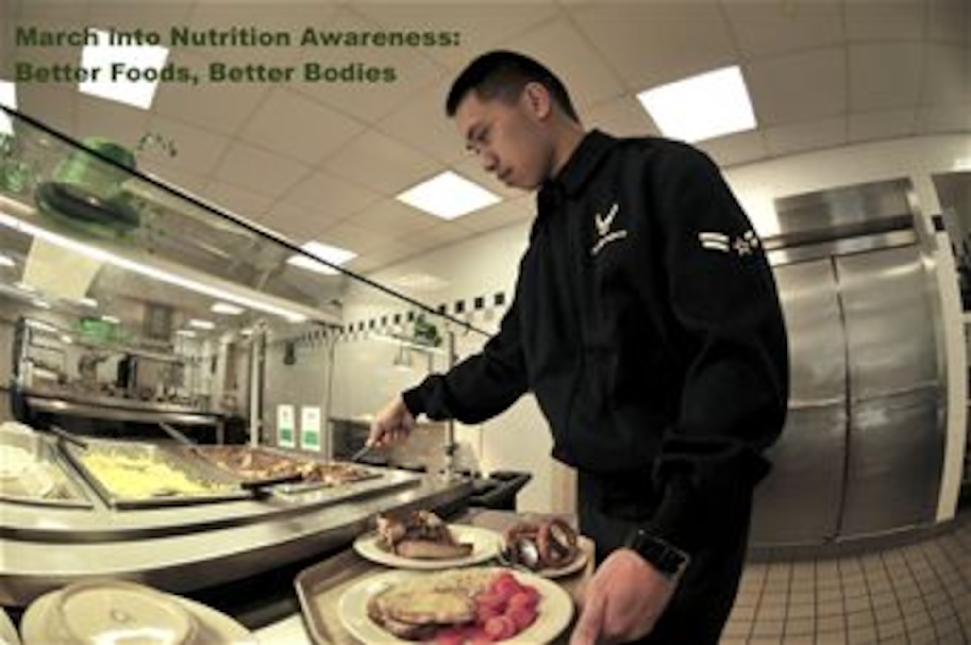Airman 1st Class Justin Baniwas is making a conscientious choice to eat healthy by “going for green” at the Joint Base Andrews, Md., Dining Facility on Feb. 28, 2014. Baniwas is with the 779th Medical Staging Squadron and works as an outpatient records technician. (U.S. Air Force photo/ Ms. Amber J. Russell) 
