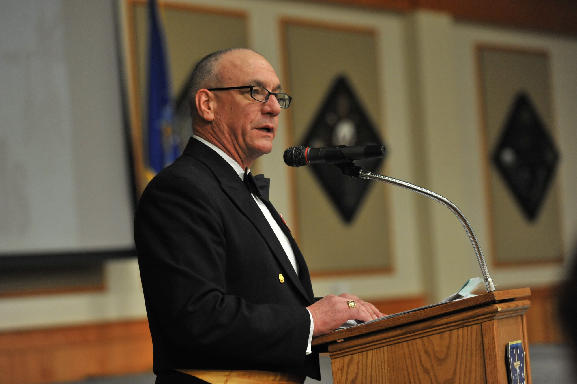 Command Master Chief Kevin Staub, Submarine Group Nine commander, gives a speech during the 2013 Annual Awards Banquet on Feb. 28.  During his speech, Staub showed his appreciation for the award winners and expressed the gratitude he felt toward every military member who raised their hand and swore an oath to defend their country. (U.S. Air Force photo/ John Turner)