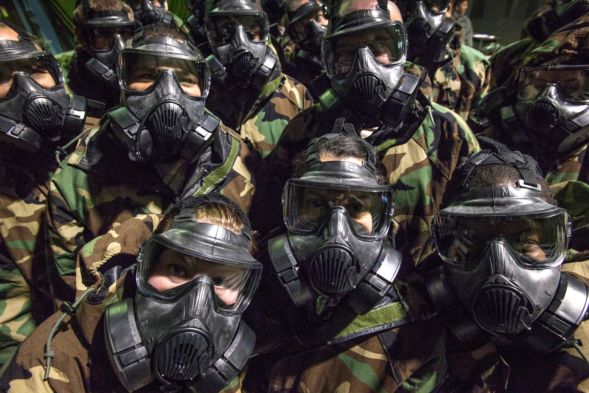 Airmen from the 108th Wing, New Jersey Air National Guard, don their M50 Joint Service General Purpose Masks as they brush up on their chemical, biological, radiological and nuclear; self-aid buddy care; post attack reconnaissance and disassembling and reassembling Beretta M9 pistol and M16 rifle skills during the Wing’s Ability to Survive and Operate Rodeo at Joint Base McGuire-Dix-Lakehurst, N.J. Feb. 9, 2014. The Wing-level evaluation shows what training areas need more focus. ATSO is used by Airmen who are deploying or preparing for exercises or inspections. These skills make up the foundation necessary for all Airmen to function effectively in hostile environments. (U.S. Air National Guard photo by Master Sgt. Mark C. Olsen/Released)