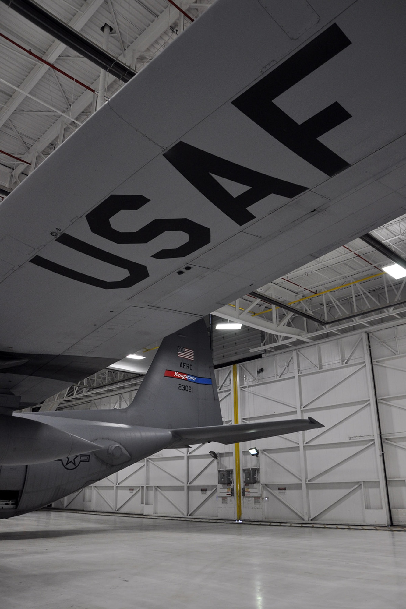 YOUNGSTOWN AIR RESERVE STATION, Ohio – Air Force Reserve C-130 Hercules cargo aircraft, 910th Airlift Wing Tail 3021, sits in a maintenance hangar prior to departing here for the final time, March 3, 2014. The aircraft is being transferred to Little Rock Air Force Base, Ark. as part of recent Air Force structure changes. The departure of 3021 from YARS leaves the 910th with eight primary C-130 aircraft and one back up aircraft assigned to the unit. U.S. Air Force photo by Master Sgt. Bob Barko Jr.