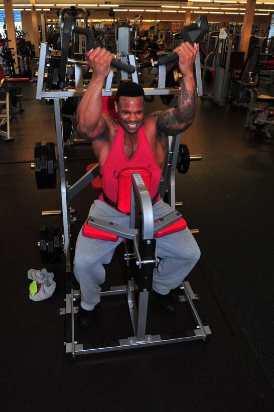Master Sgt. Randy Aikens, 325th Maintenance Squadron test cell section chief, weight trains March 5 at the base fitness center. (U.S. Air Force photo by Staff Sgt. Rachelle Blake)