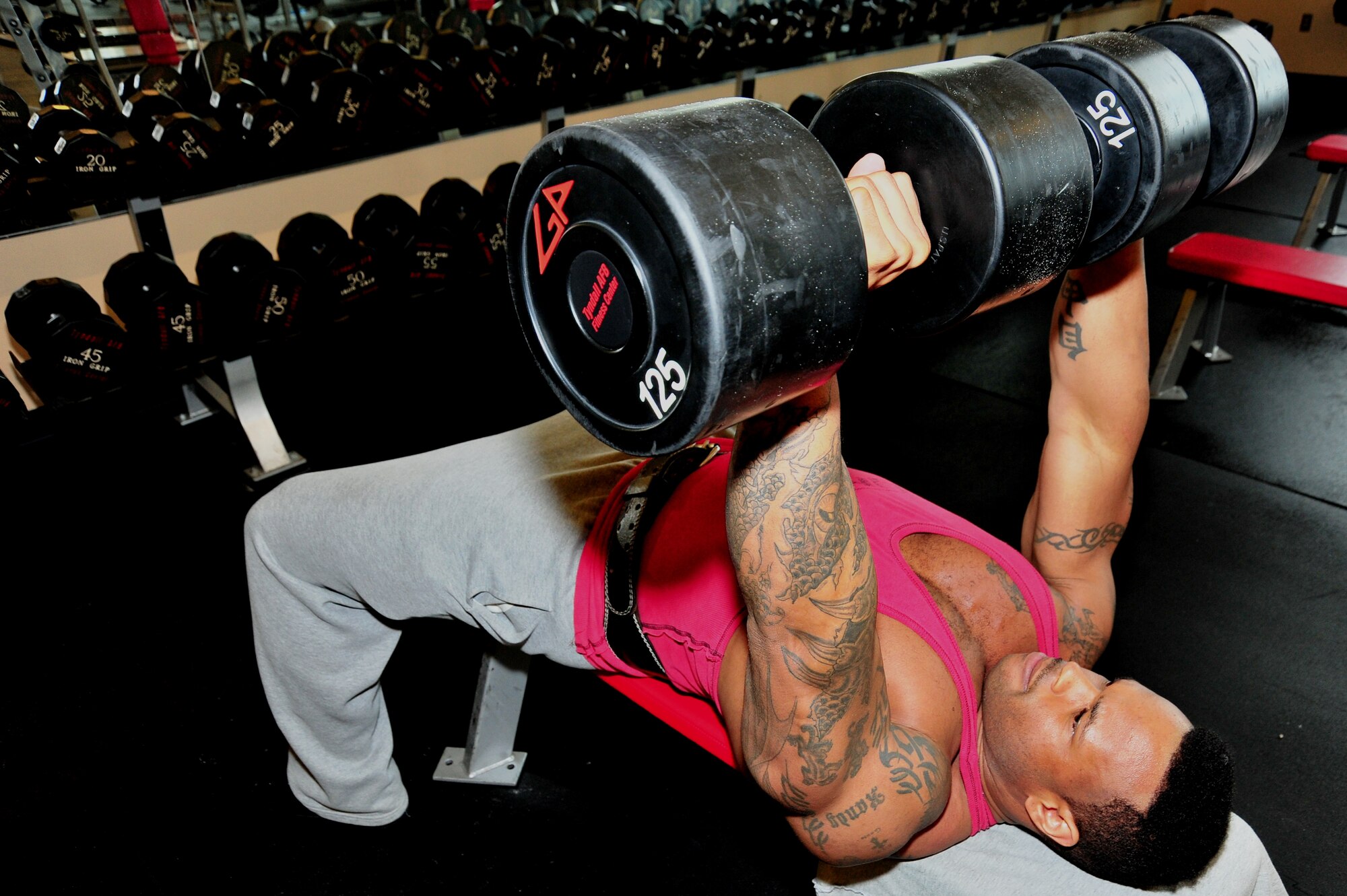 Master Sgt. Randy Aikens, 325th Maintenance Squadron test cell section chief, weight trains March 5 at the base fitness center. (U.S. Air Force photo by Staff Sgt. Rachelle Blake)
