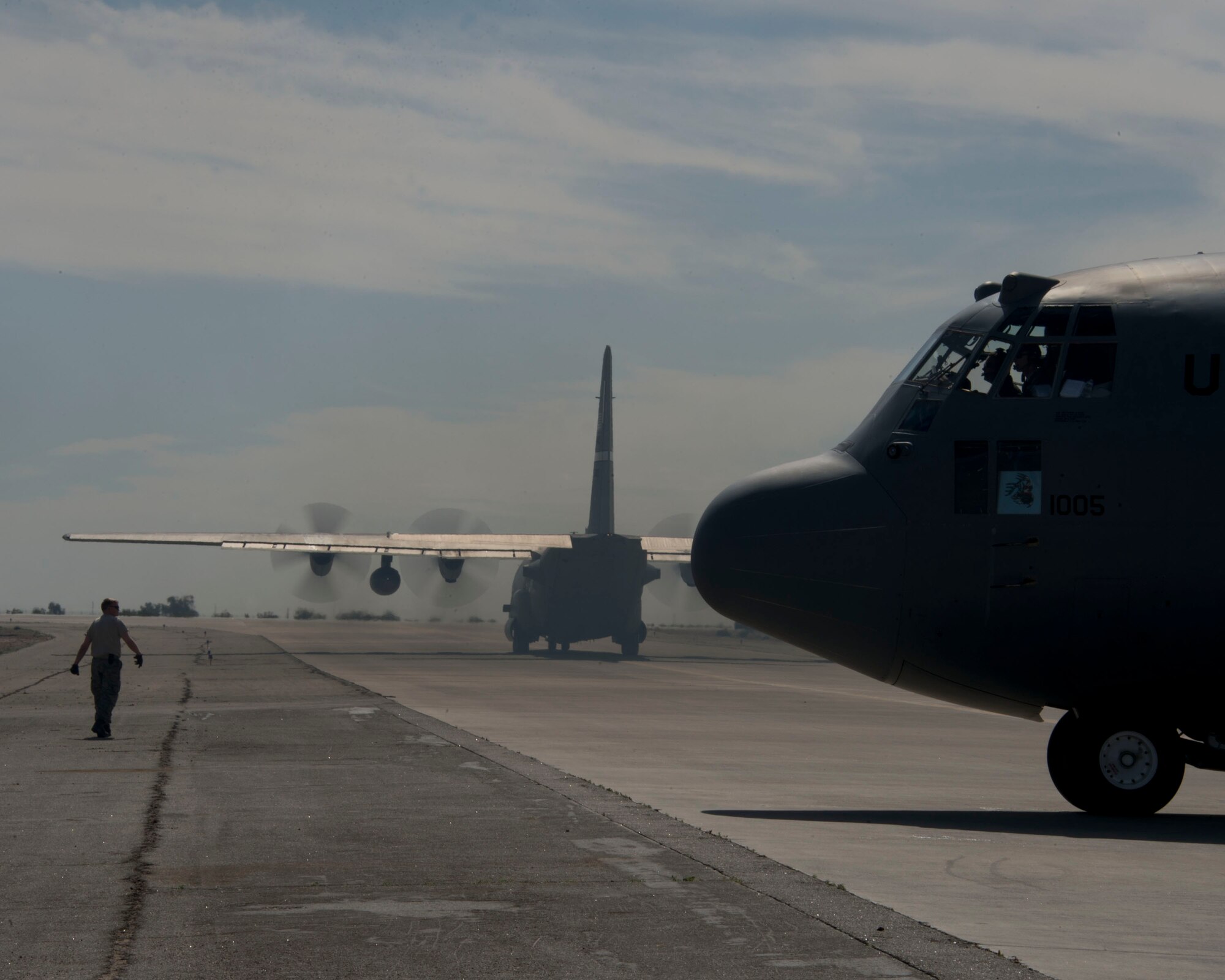 A Minnesota Air National Guard C-130 Hercules taxis off the Marine Corps Air Station ramp in Yuma, Ariz. Feb. 26, 2014. Airmen from the 133rd Airlift Wing and 109th Airlift Squadron are making use of the warm climate to accomplish six-months of airdrops and other annual training requirements in a six-day time period.
(U.S. Air National Guard photo Tech. Sgt. Amy M. Lovgren/ Released) 