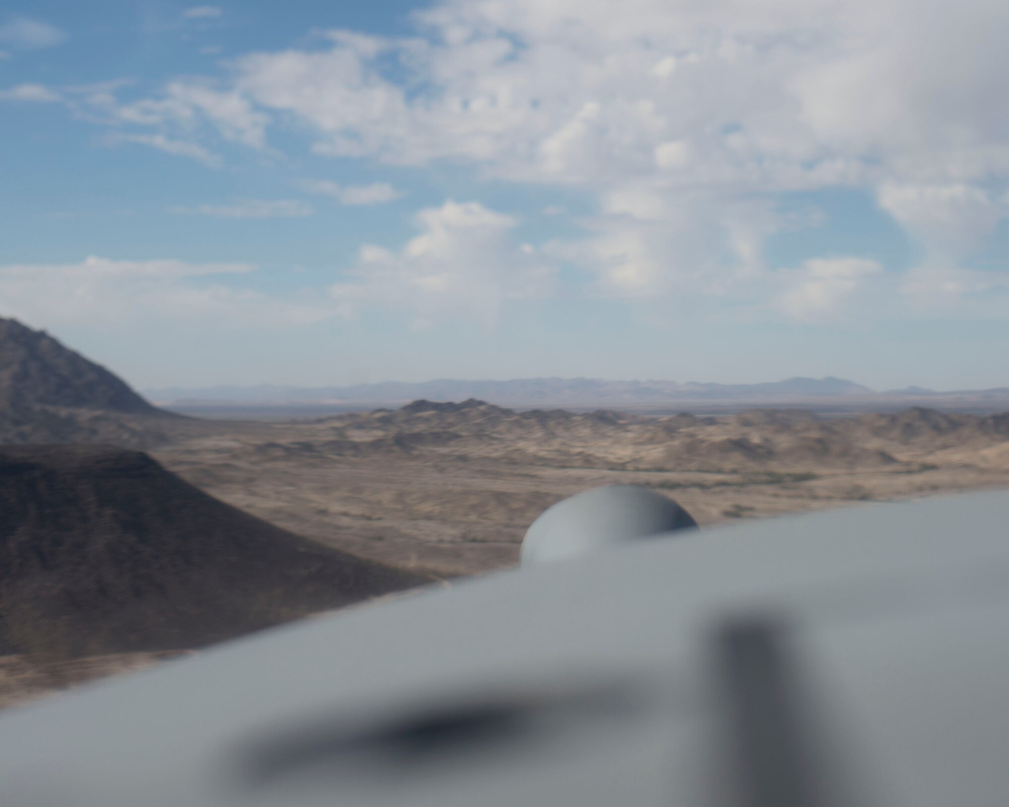 Airmen from the 109th Airlift Squadron conduct a low-cost, low-altitude airdrop in Yuma, Ariz. Feb., 24, 2014. The Airmen are making use of the warm climate to knockout six-months of training in six days.
(U.S. Air National Guard photo Tech. Sgt. Amy M. Lovgren/ Released) 