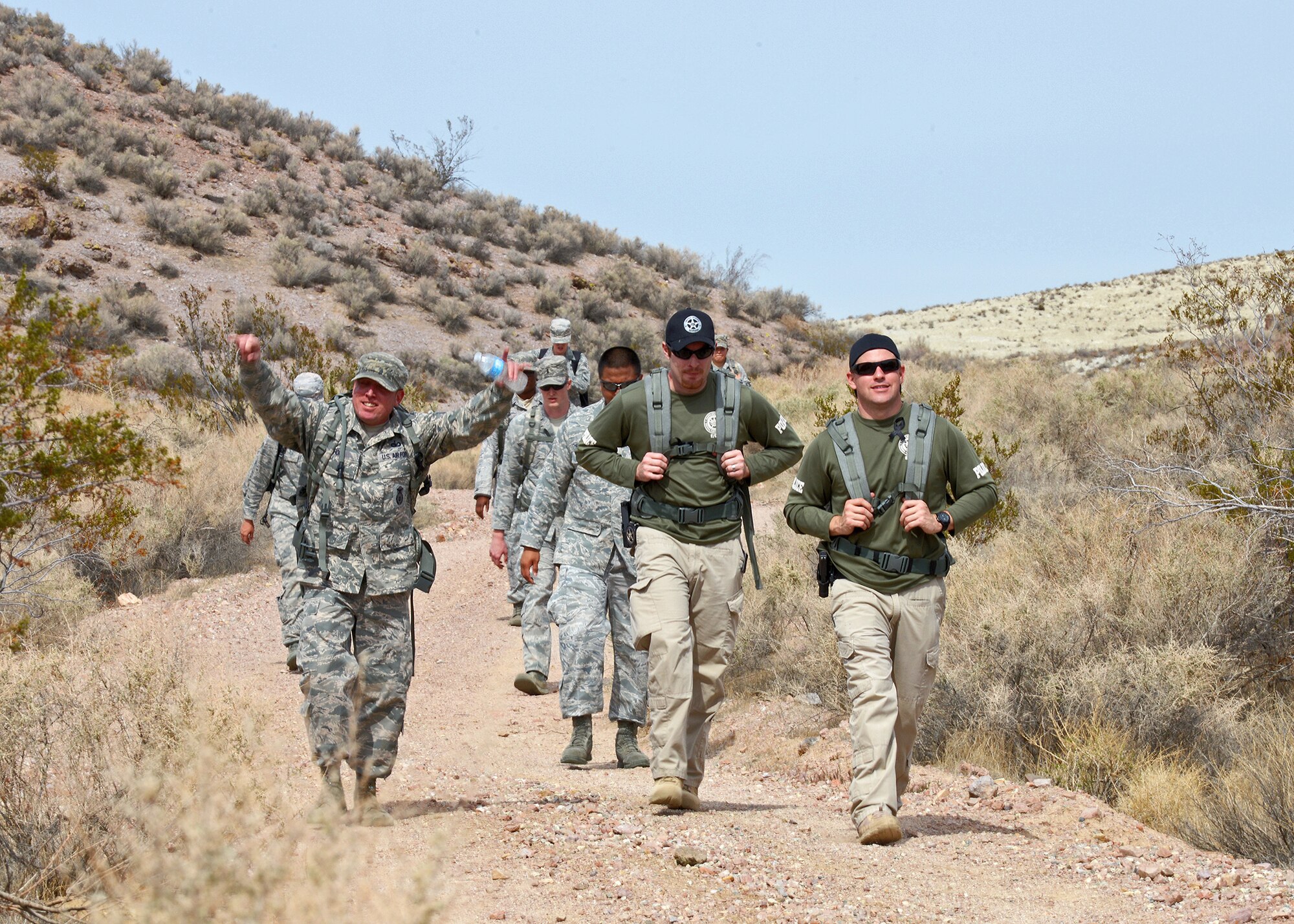 A couple deputies from the U.S. Marshals Service also participated in the ruck march. (U.S. Air Force photo by Jet Fabara)