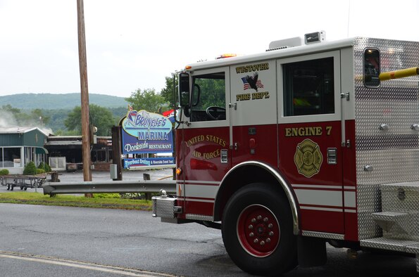 A 4-man engine company from Westover, as well as two men with a mobile air supply unit responded to the Brunelle Marina Fire in South Hadley, Mass. the morning of July 26, 2013. (U.S. Air Force photo/SSgt. Kelly Goonan)