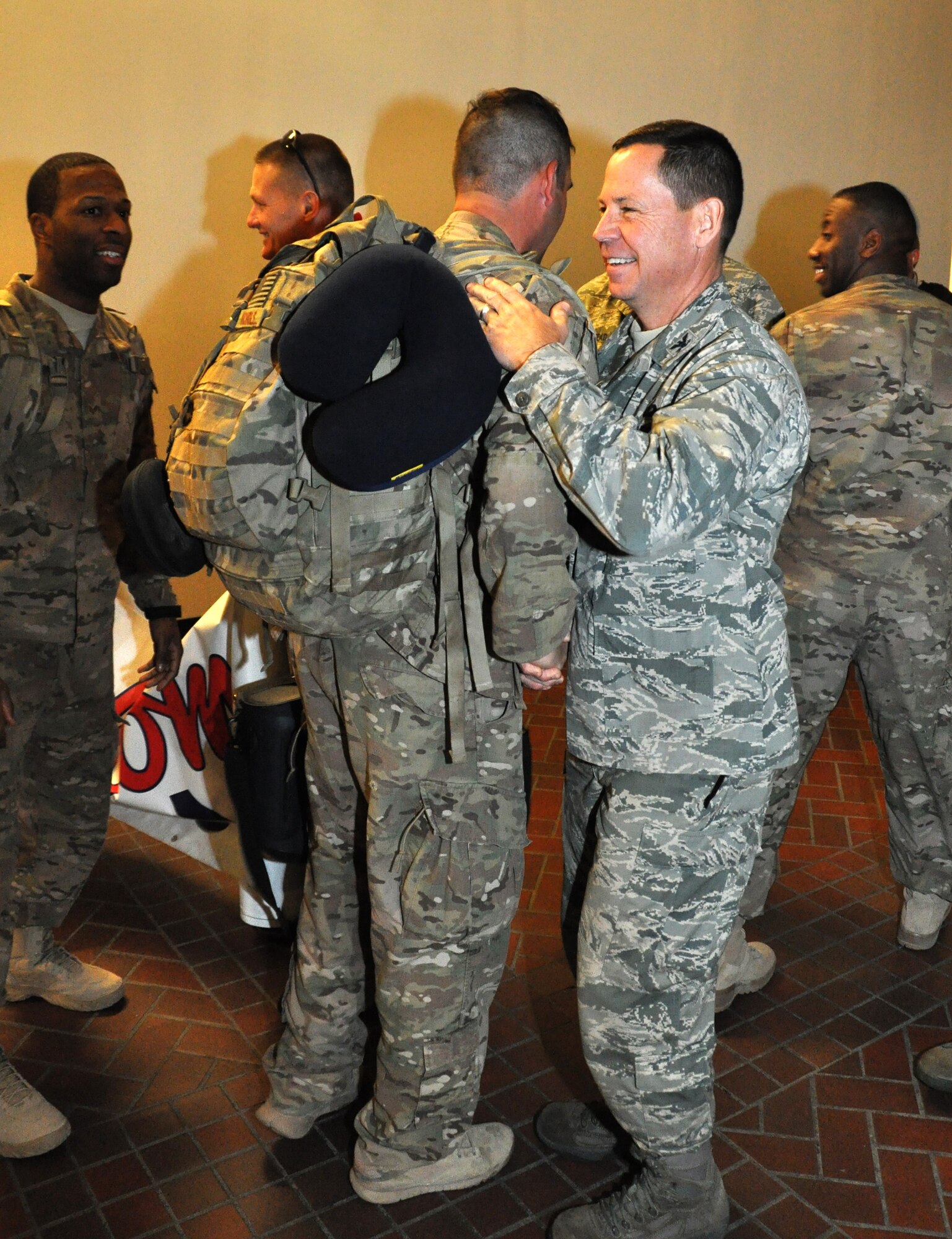 The 315th Security Forces Squadron are greeted by family, friends and coworkers as they return from a six-month deployment. (Air Force Photo/Tech. Sergeant Shane Ellis)