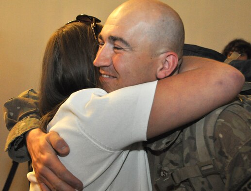 The 315th Security Forces Squadron are greeted by family, friends and coworkers as they return from a six-month deployment. (Air Force Photo/Tech. Sergeant Shane Ellis)