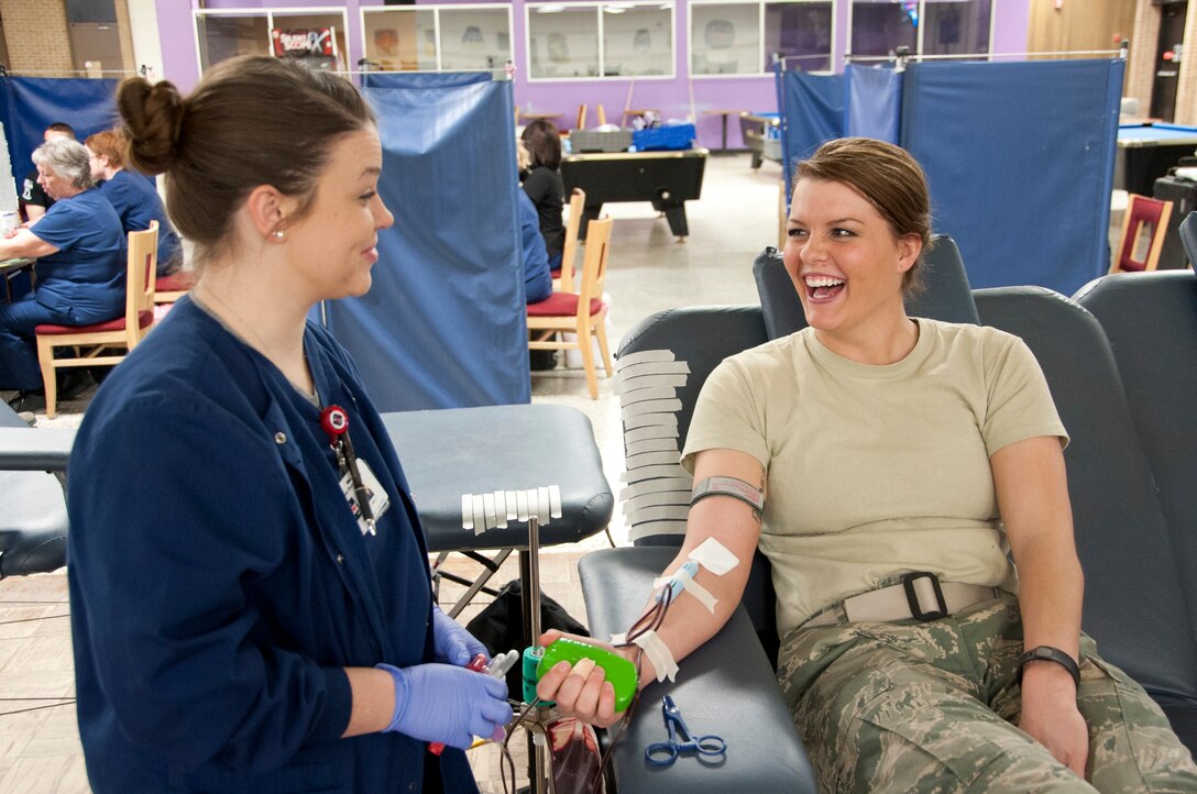 Airman 1st Class Megan Huseby, 365th Training Squadron student, donates blood at the Sheppard Air Force, Texas, blood drive Feb. 13, 2014. During the three-day drive, 526 Sheppard donors contributed 381 units of blood to the Texas Blood Institute blood bank. (U.S. Air Force photo/Airman 1st Class Robert L. McIlrath)