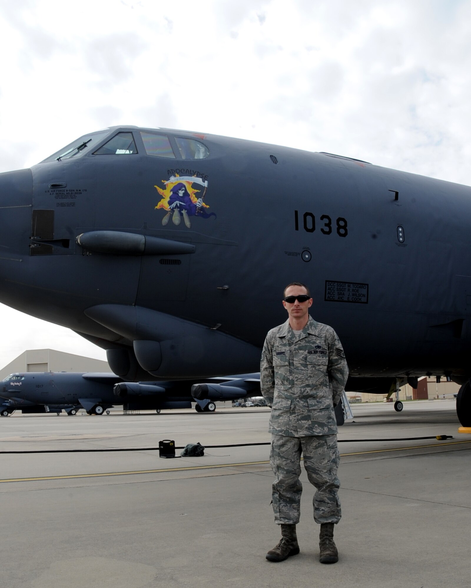 Staff Sgt. Michael Todaro, 2nd Aircraft Maintenance Squadron dedicated crew chief, poses for a photo in front of his aircraft on Barksdale Air Force Base, La., Mar 4, 2014. Todaro was recently selected as a crew chief position on Air Force 2 at Andrew Air Force Base, Md. (U.S. Air Force photo/Staff Sgt. Sean Martin)
