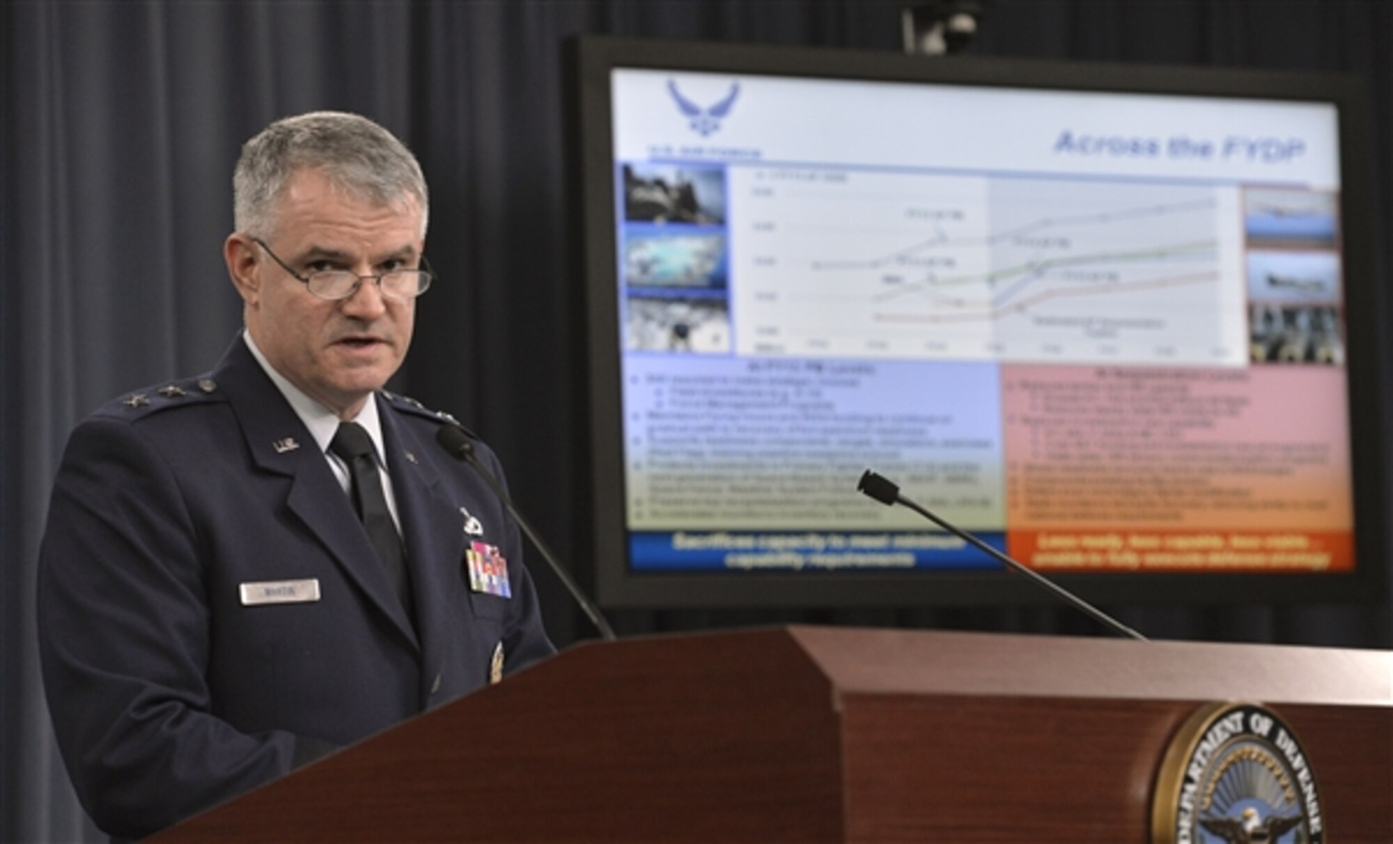Maj. Gen. James F. Martin Jr., Air Force budget director, briefs reporters on the Air Force's fiscal 2015 budget request at the Pentagon on March 4, 2014. (DOD photo/Glenn Fawcett) 