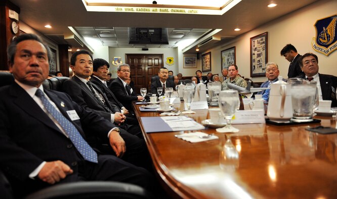 U.S. Air Force Brig. Gen. James Hecker, 18th Wing commander, briefs members of Japan-America Air Force Goodwill Association during their tour on Kadena Air Base, Japan, March 4, 2014. JAAGA members visited Kadena Air Base to deepen their understanding of the organizational structure and mission of the United States Forces Japan and to receive up-to-date information. (U.S. Air Force photo by Naoto Anazawa)