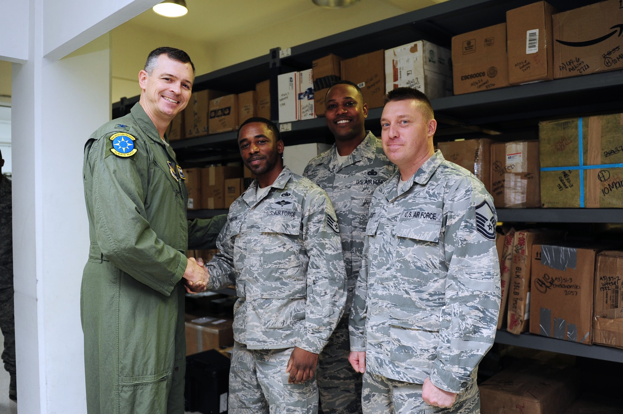 Staff Sgt. Bobby Johnson, 39th Communications Squadron postal specialist, is awarded the "Pick of the 'Lik" for the week of Mar. 5, 2014, Incirlik Air Base, Turkey. The 39th Air Base Wing leadership recognizes Airmen for demonstrating outstanding leadership and job performance abilities. (U.S. Air Force photo by Senior Airman Nicole Sikorski/Released)