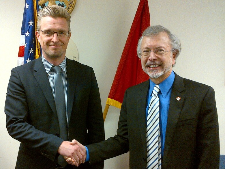 Mr. Hans Denker Thulstrup (left), UNESCO, is welcomed by Mr. Robert Pietrowsky (right), Director of the USACE Institute for Water Resources and the International Center for Integrated Water Resources Management (ICIWaRM), under the auspices of UNESCO.