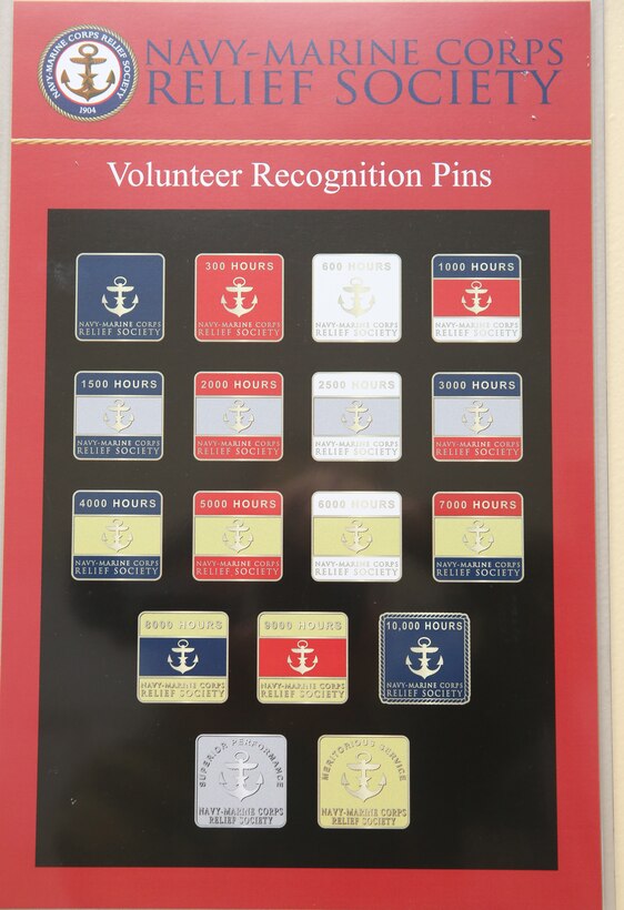 Volunteers earn recognition pins for the times and effort they donate to the Navy Marine Corps Relief Society. Volunteers receive pins for services ranging from becoming a volunteer to volunteering for more than 10,000 hours with the society.


