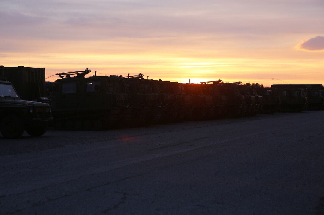Norwegian vehicles and equipment are staged at Vaernes Garrison, Norway, before supply and medical operations in support of multinational forces during Cold Response 2014 March 1, 2014. The combination of units is meant to prove that the partnering nations can depend on each other during Cold Response and future endeavors. Cold Response 2014 is a Norwegian-led multinational exercise above the Arctic Circle designed prepare for crisis-response operations. 