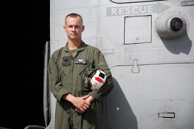 Sgt. Jessy Longan, avionics quality assurance representative with Marine Heavy Helicopter Squadron 463, recently scored a perfect score at the Puuloa Range Training Facility. Longan is the second Marine to get a perfect score at the facility since August 2013. (U.S. Marine Corps photo by Lance Cpl. Janelle Y. Villa)
