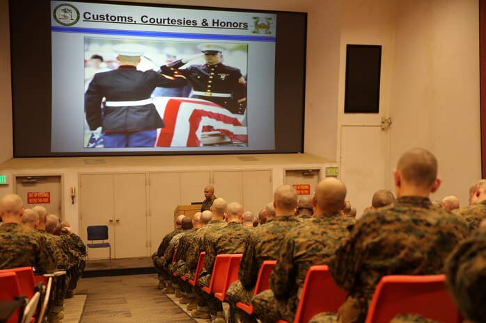 Recruits of Company A, 1st Recruit Training Battalion, study during a customs and courtesies class aboard the depot, Feb. 19.  Customs are a representation of some of the long standing traditions in the Marine Corps.