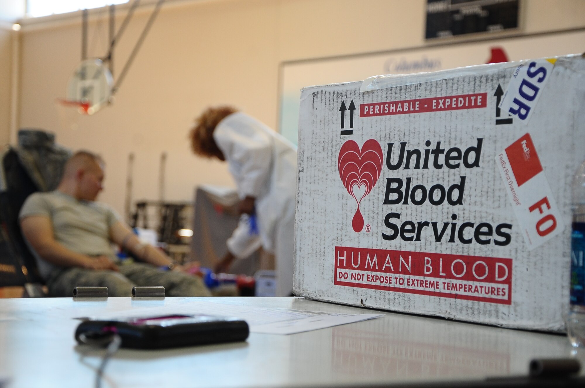 Columbus Air Force Airmen and civilians participate in blood drive at the fitness center Feb. 28. Approximately 25 percent of blood donated comes back to help service members in need. (U.S. Air Force Photo/Airman John Day)